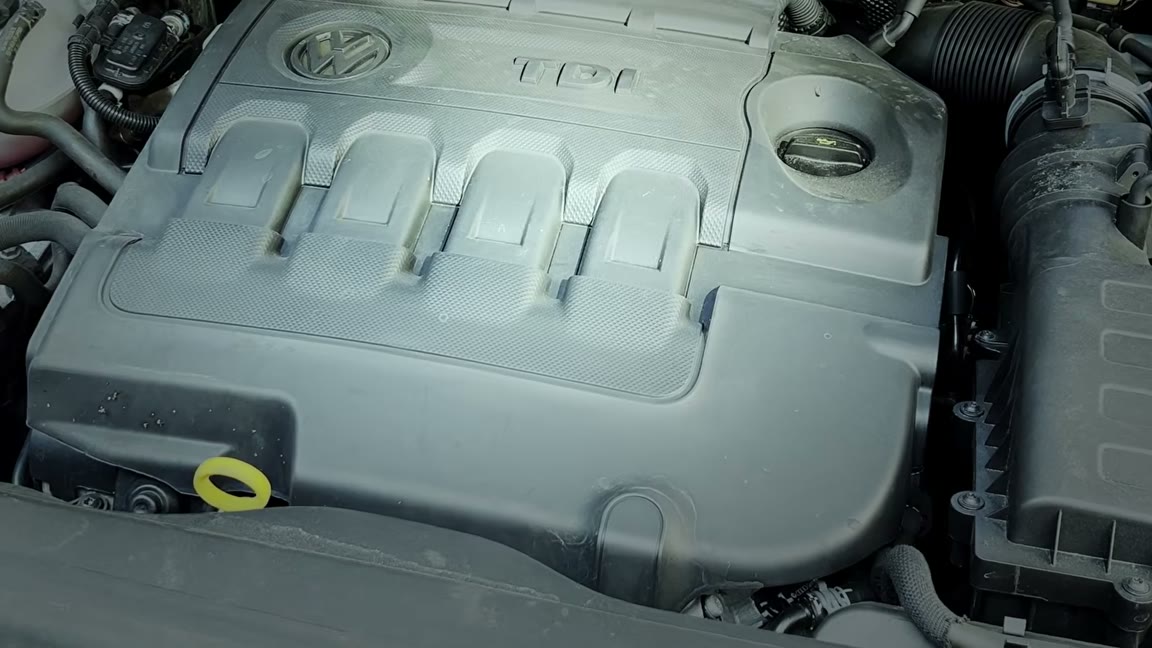 A CarAudit technician inspecting a used car